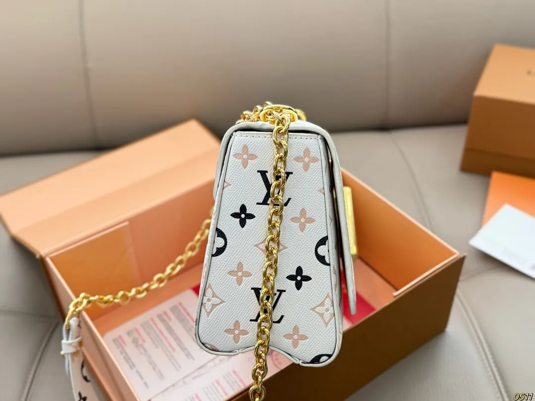 ¥145折叠盒 原版五金带logo LVTwist新款包包 复古优雅 永远的经典 正式休闲皆可 日常通勤无压力 尺寸:23 16