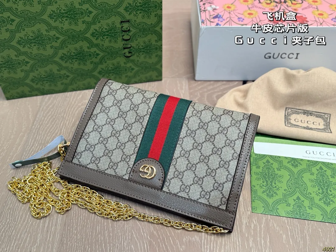 &yen;160飞机盒芯片版牛皮 原单专柜品质 夹子包 ｜Gucci Ophidia 夹子包 最新系列，链条包，配原版乌木色牛皮～这个款复古韵味特别浓，对版链条⛓，原版内里！上身效果也超赞，主要以精致特别的五金来提升整体质感。尺寸：26 17