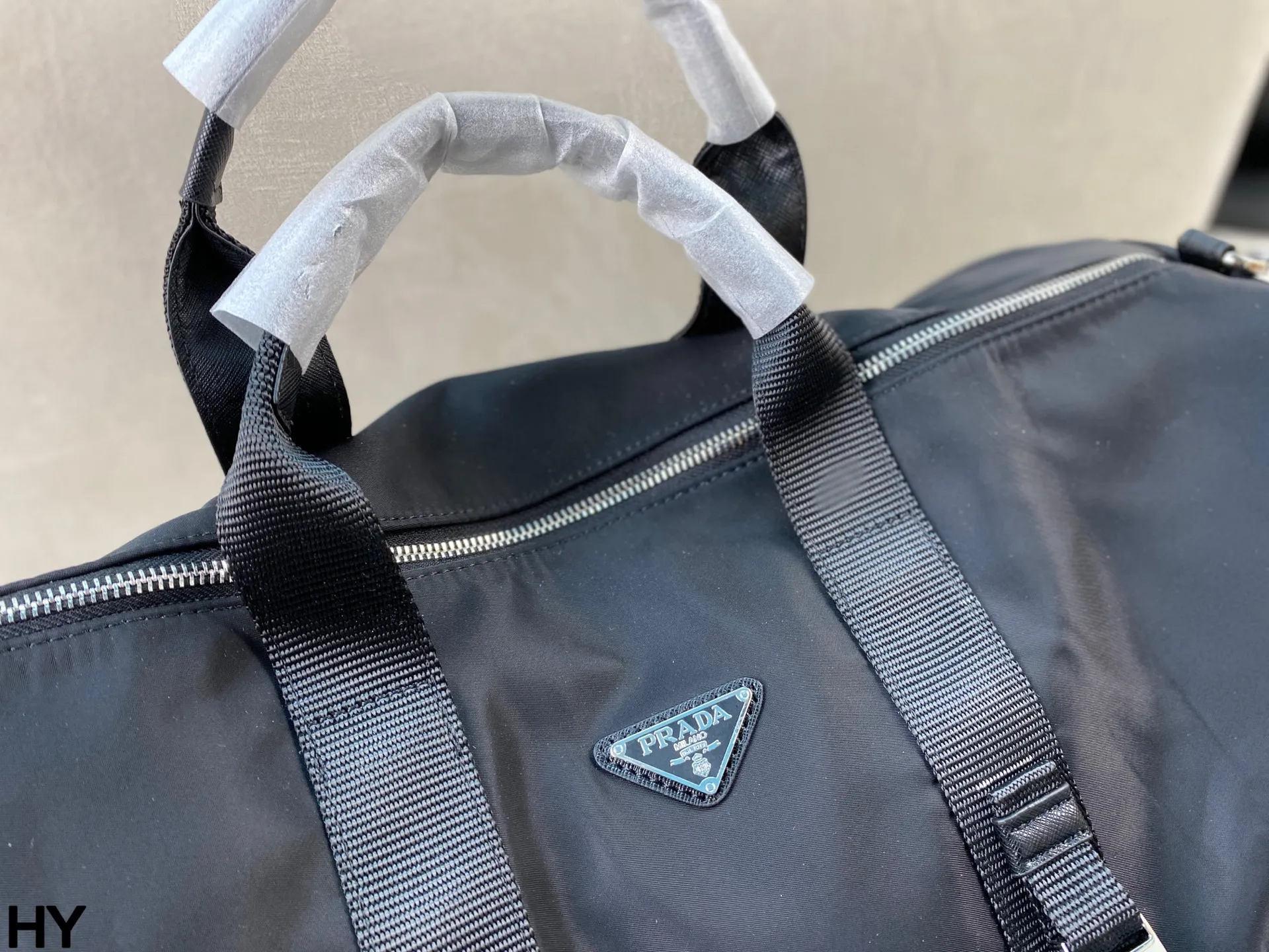 p165 无盒🎁 Prada旅行袋 男女同款 经典尼龙质地便携自重轻 去健身或者旅行都非常适用!尺寸:底50*宽24*高24