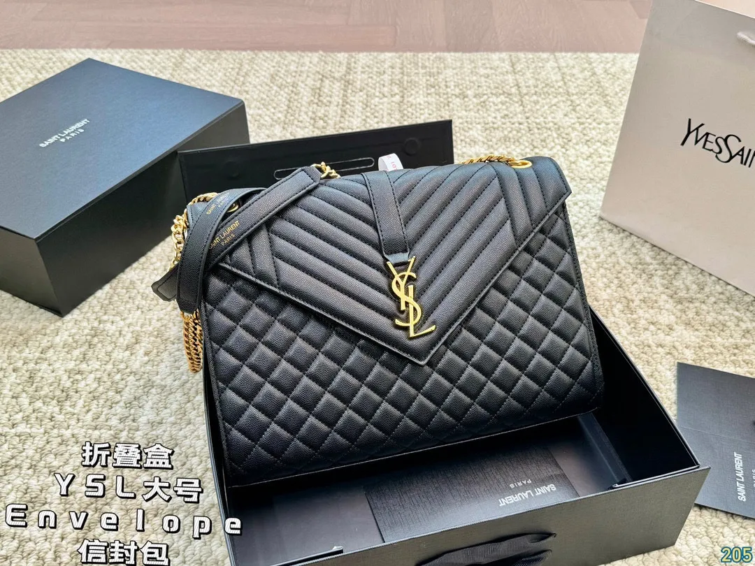 大号&yen;155折叠盒 圣罗兰YSL Envelope信封包 简约才是百搭公式。 复古又时髦，妥妥的街拍神器。 出街通勤都可。 容量很大，可肩背、斜挎。 搭配很显高级感。 是帅气女孩不可缺少的一款经典存在。 尺寸大号31 21