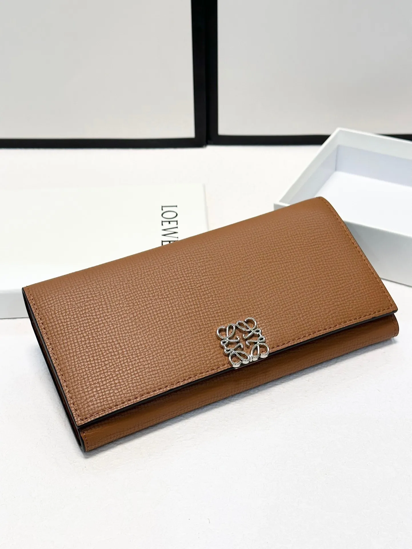 P125🎀🎀颜色 大象灰 黑色 灰白 土黄色 🎀尺寸 19x10🎀罗意威爆款牛皮长款钱包🔥款式经典做工精细耐磨耐用手感极佳❤️