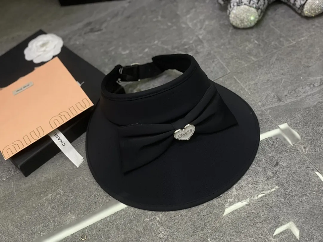 Miumiu 蝴蝶结冰丝空顶帽