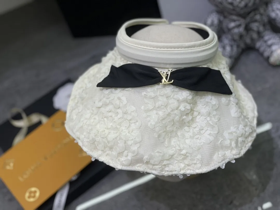 Lv 蝴蝶结蕾丝空顶帽