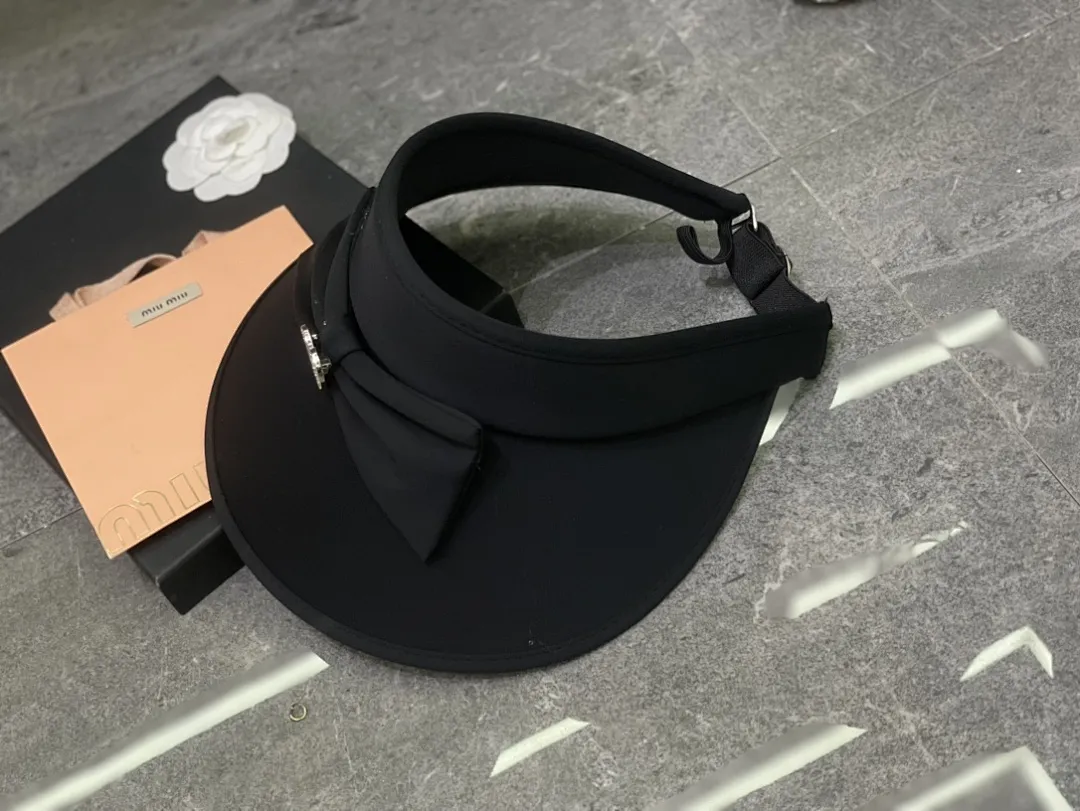 Miumiu 蝴蝶结冰丝空顶帽