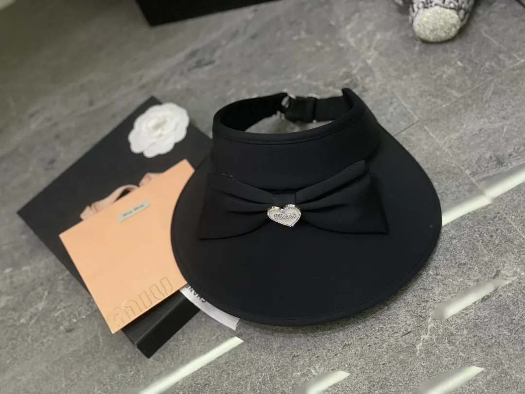 Miumiu 蝴蝶结冰丝空顶帽