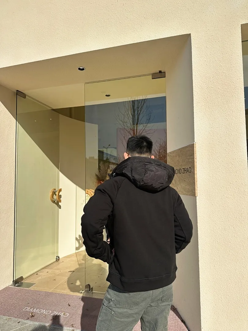 MONCLER蒙口MC 三角标梭织拼接连帽羽绒服