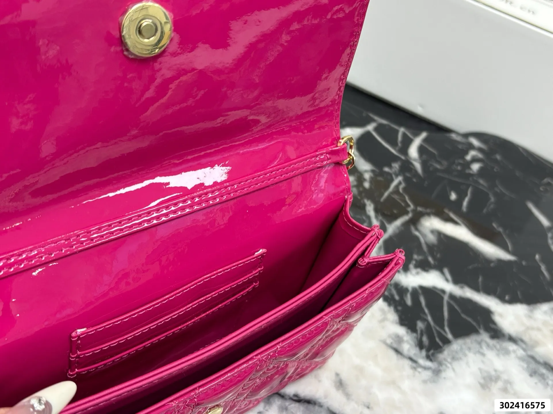 Collection of Lady Dior pouches in colorful patent leather with gold charms and luxury packaging - xiashuluxe