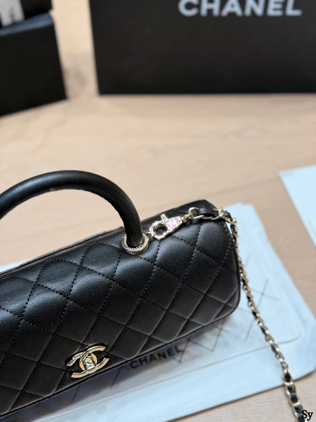 Chanel black caviar leather mini Kelly bag with top handle and gold hardware - xiashuluxe