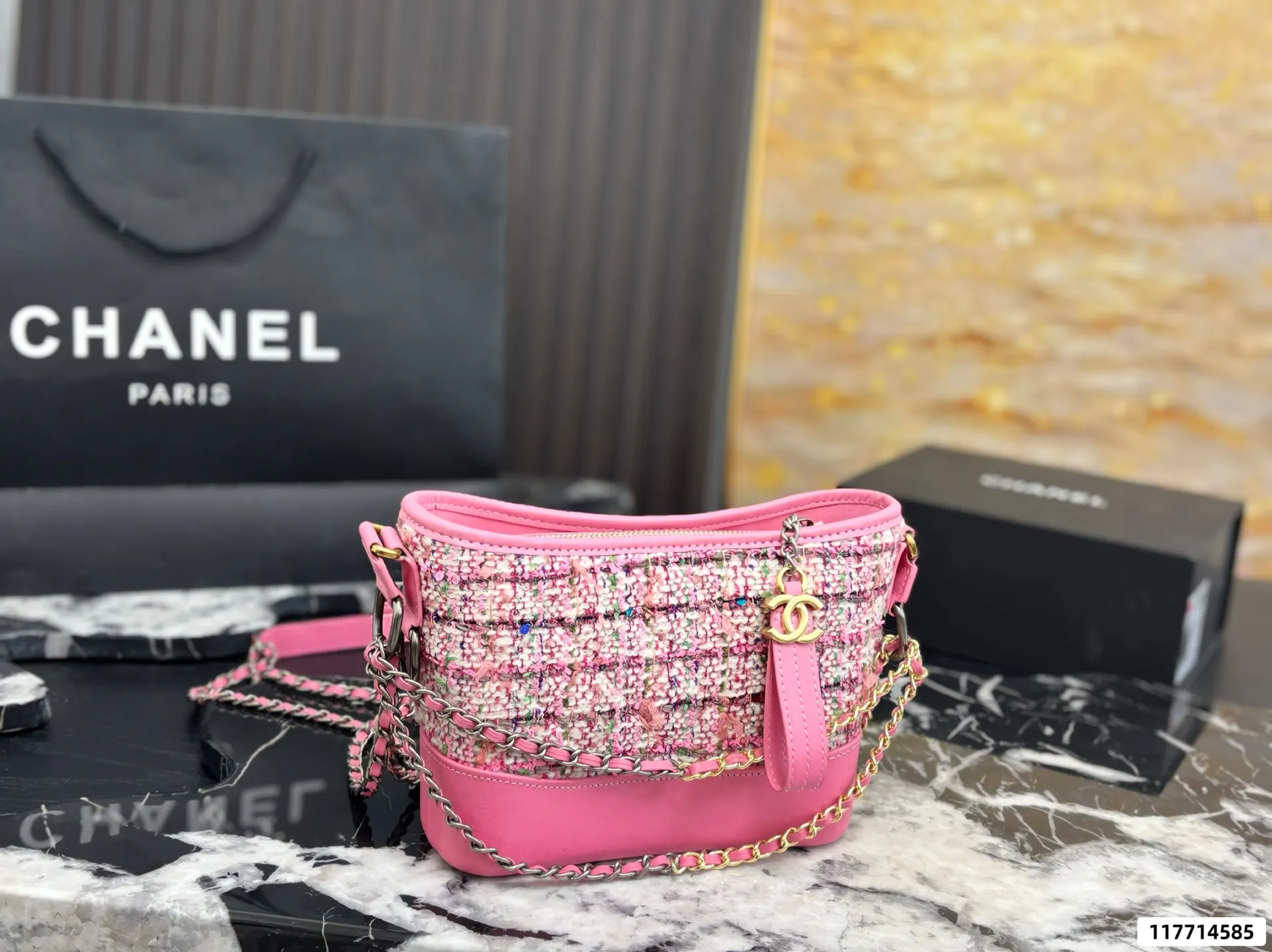 Collection of Chanel Gabrielle hobo bags in various materials including tweed and sequins with luxury packaging - xiashuluxe