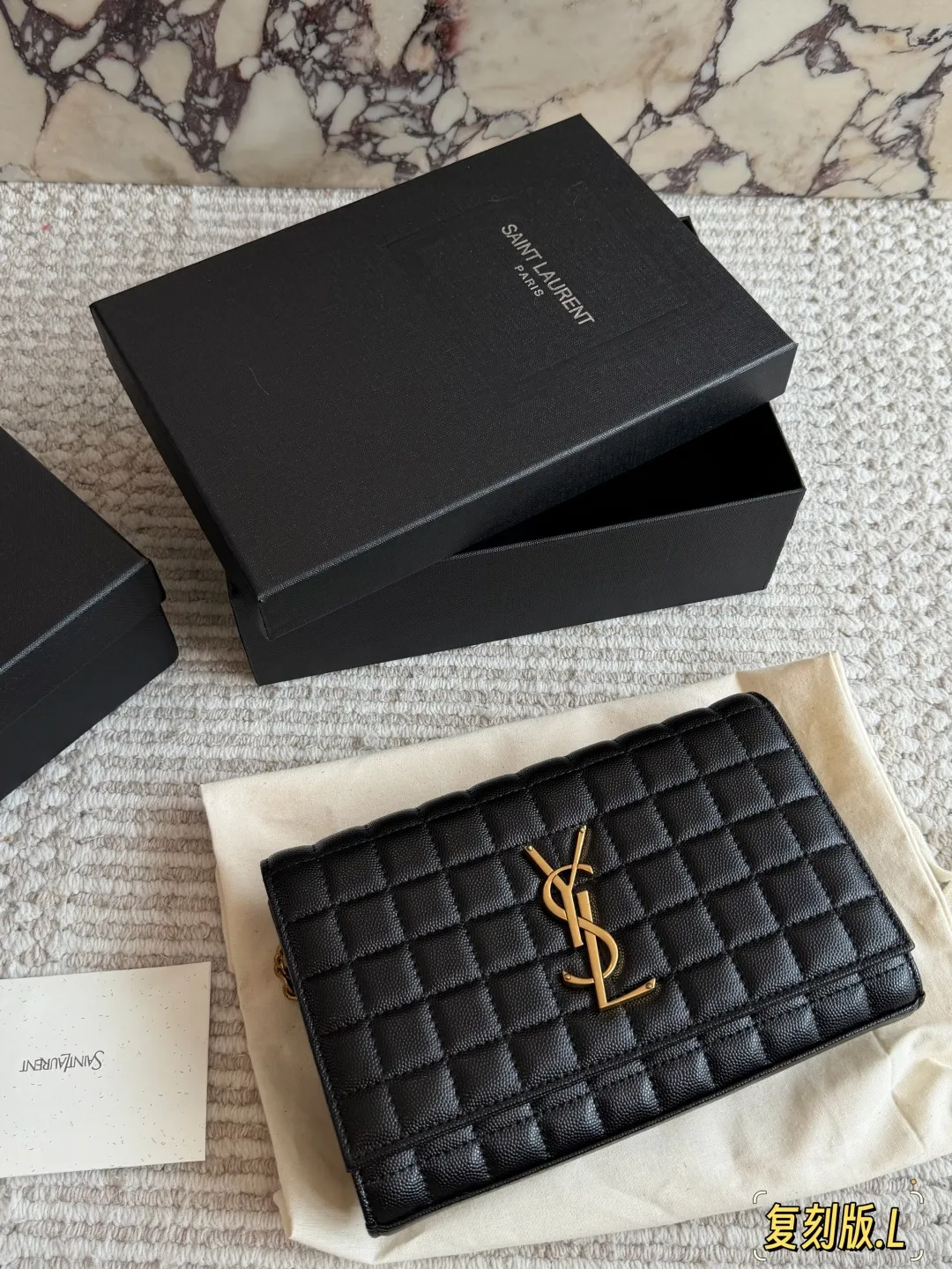 YSL Gaby white quilted leather envelope bag with original brand packaging - xiashuluxe