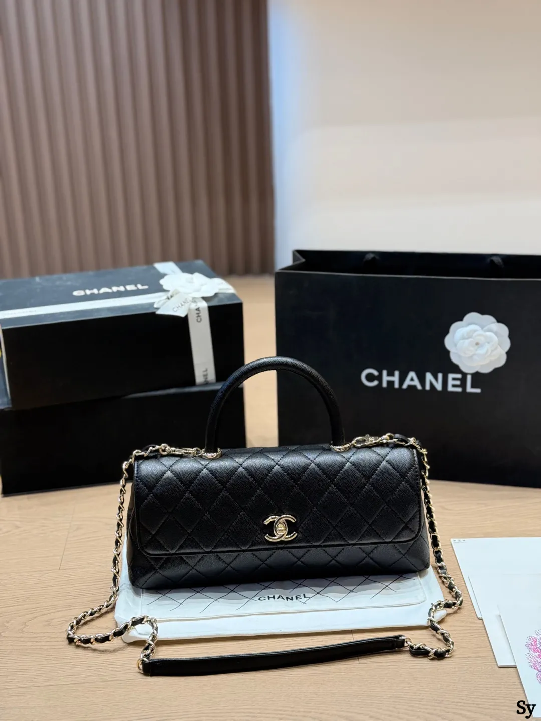 Chanel black caviar leather mini Kelly bag with top handle and gold hardware - xiashuluxe