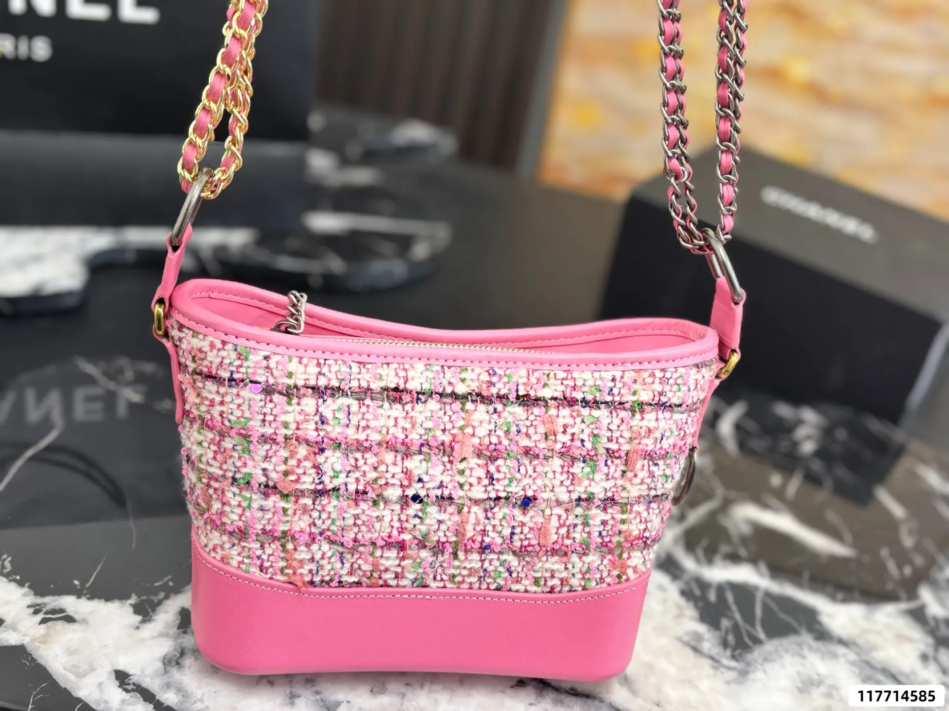 Collection of Chanel Gabrielle hobo bags in various materials including tweed and sequins with luxury packaging - xiashuluxe