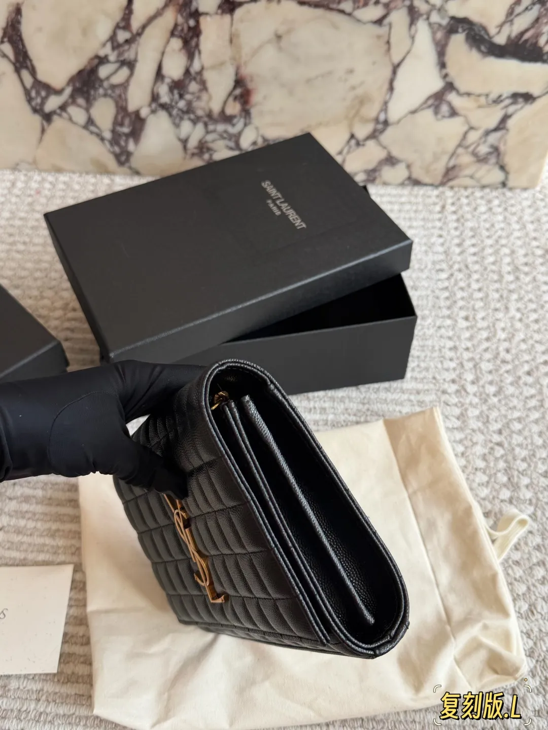 YSL Gaby white quilted leather envelope bag with original brand packaging - xiashuluxe