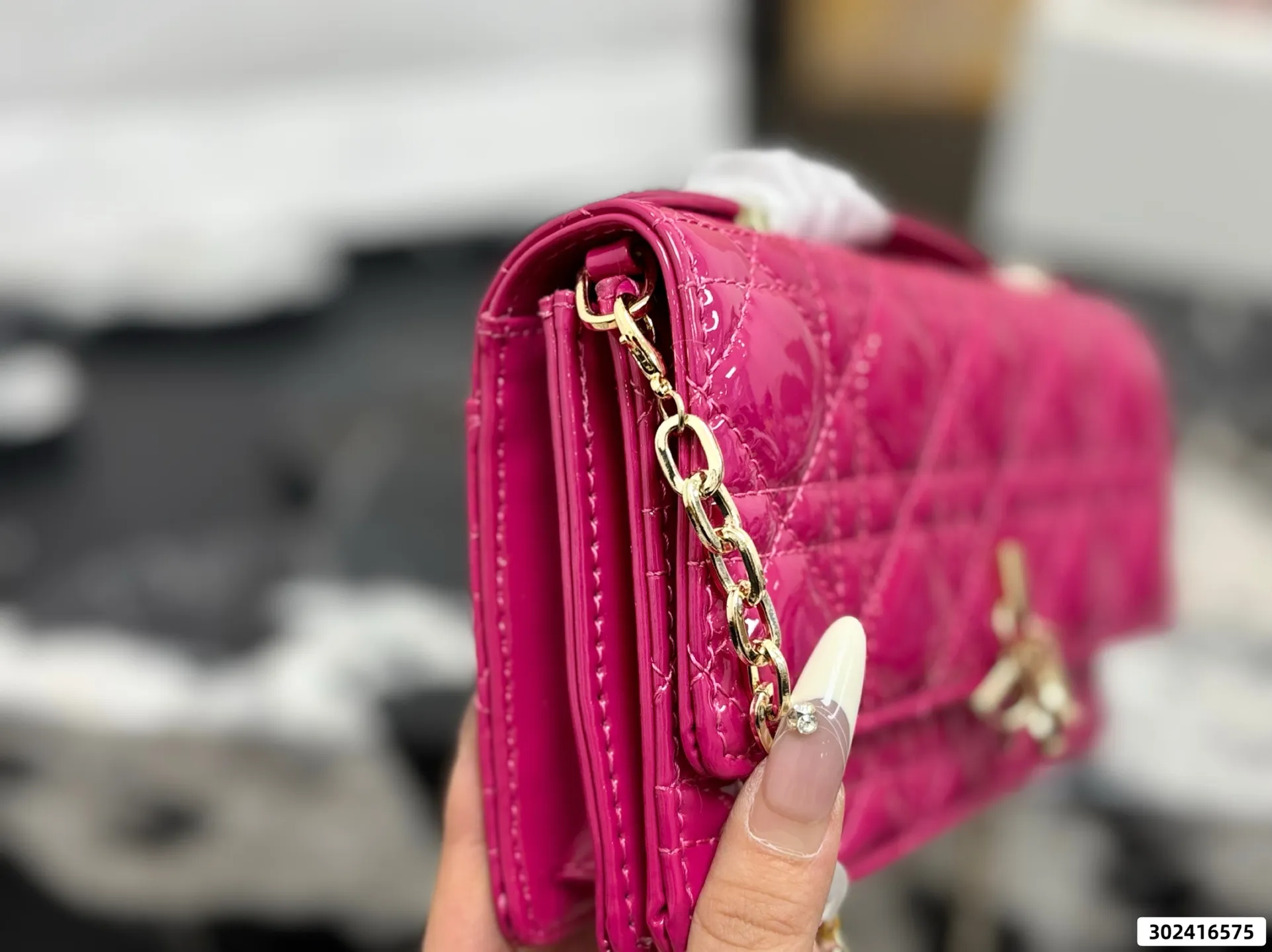 Collection of Lady Dior pouches in colorful patent leather with gold charms and luxury packaging - xiashuluxe