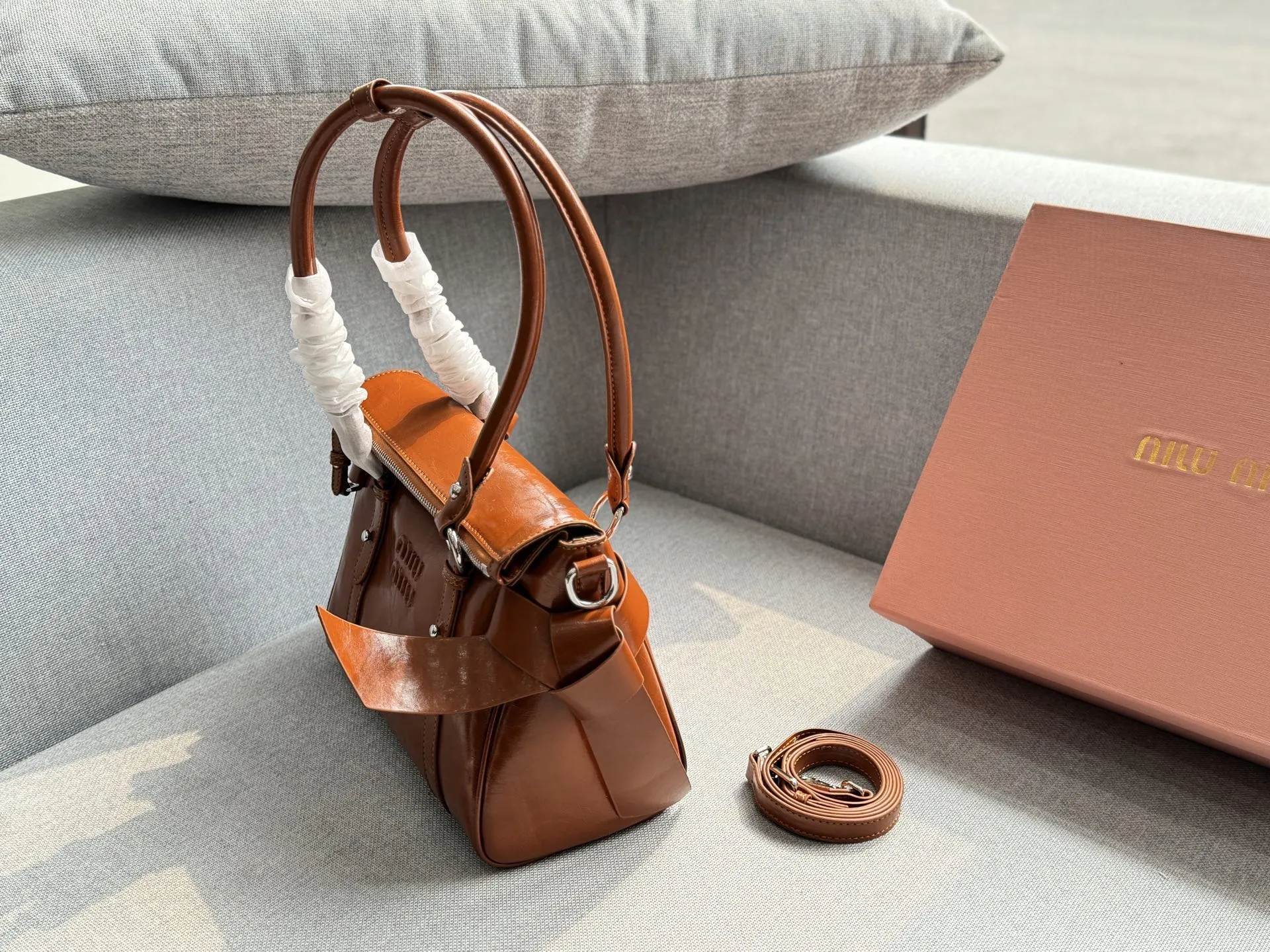 Collection of Miu Miu waxed leather shoulder bags with bow decorations in multiple colors (Black, Brown, Grey, Beige) - Size 26 - xiashuluxe