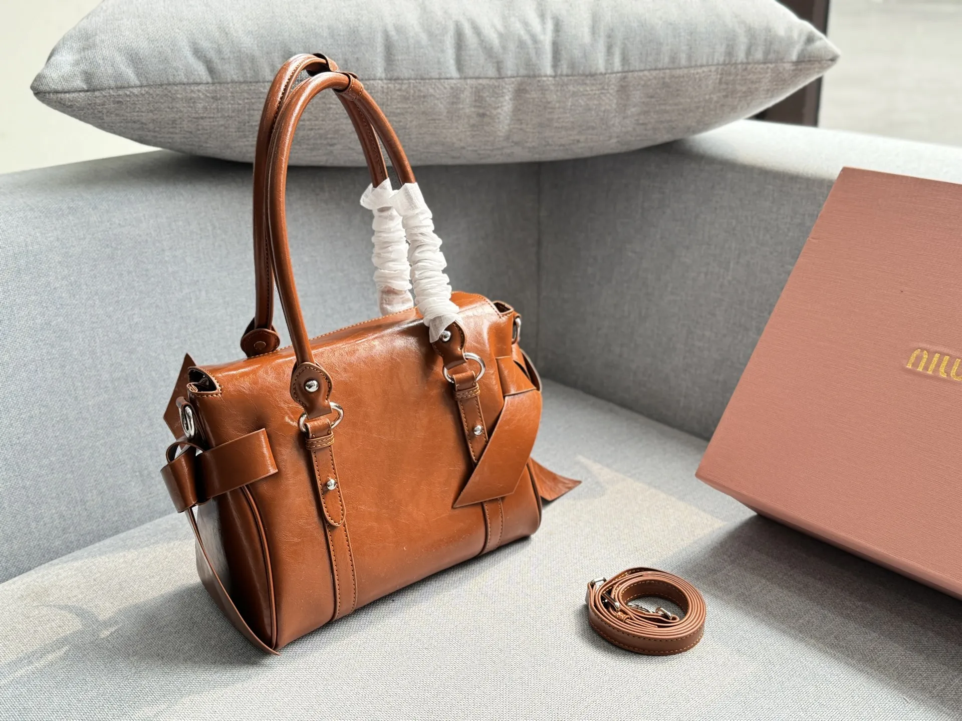 Collection of Miu Miu waxed leather shoulder bags with bow decorations in multiple colors (Black, Brown, Grey, Beige) - Size 26 - xiashuluxe