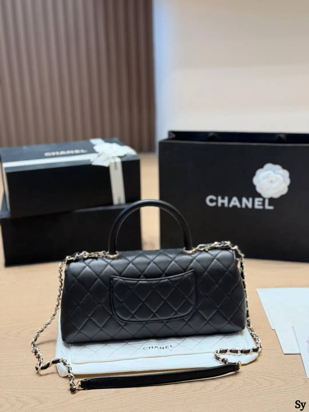 Chanel black caviar leather mini Kelly bag with top handle and gold hardware - xiashuluxe