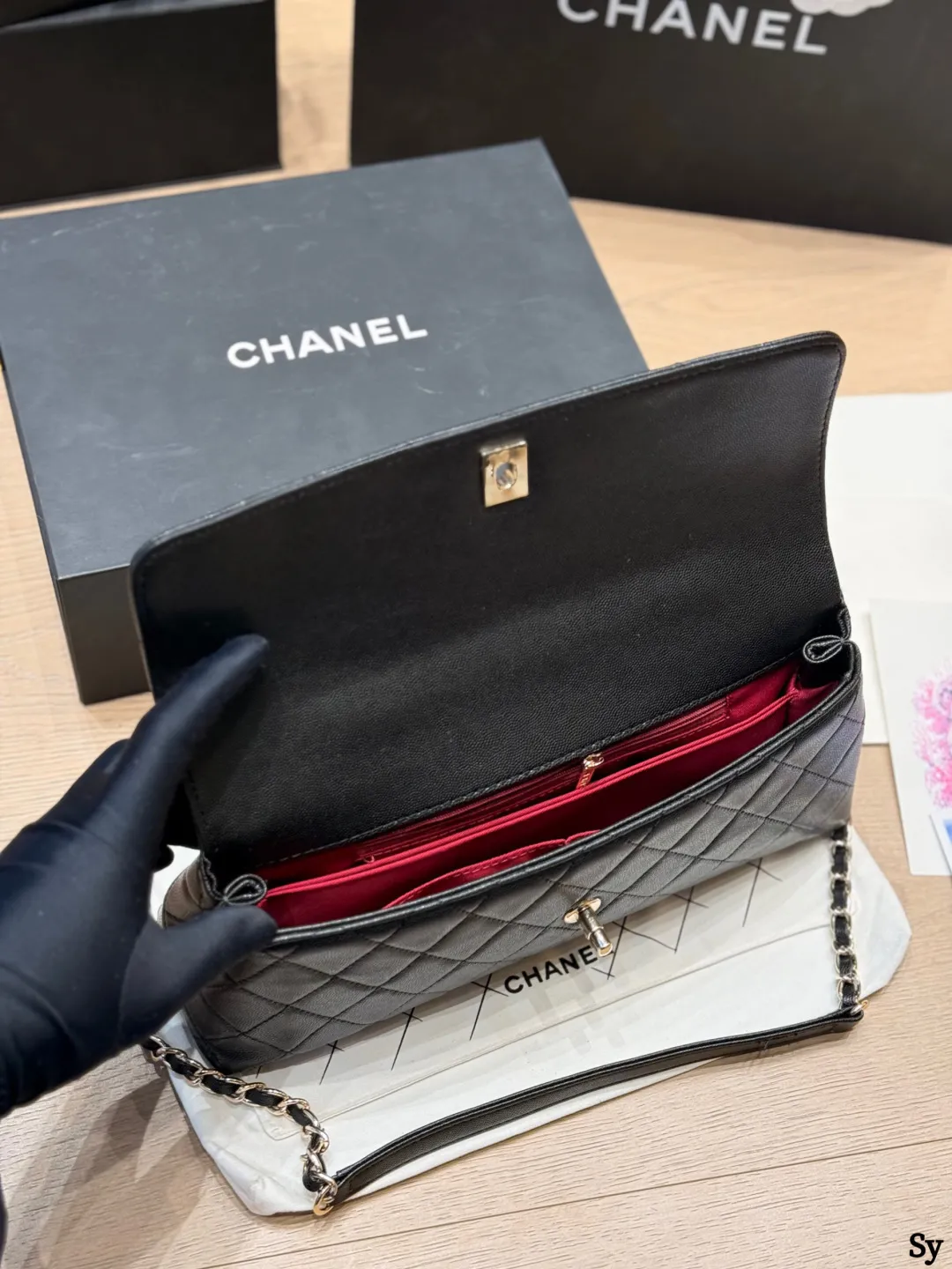 Chanel black caviar leather mini Kelly bag with top handle and gold hardware - xiashuluxe