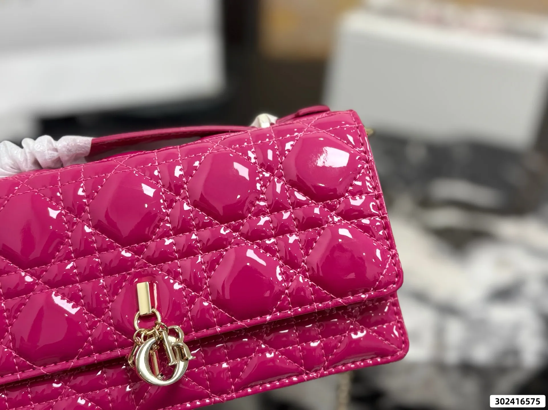 Collection of Lady Dior pouches in colorful patent leather with gold charms and luxury packaging - xiashuluxe