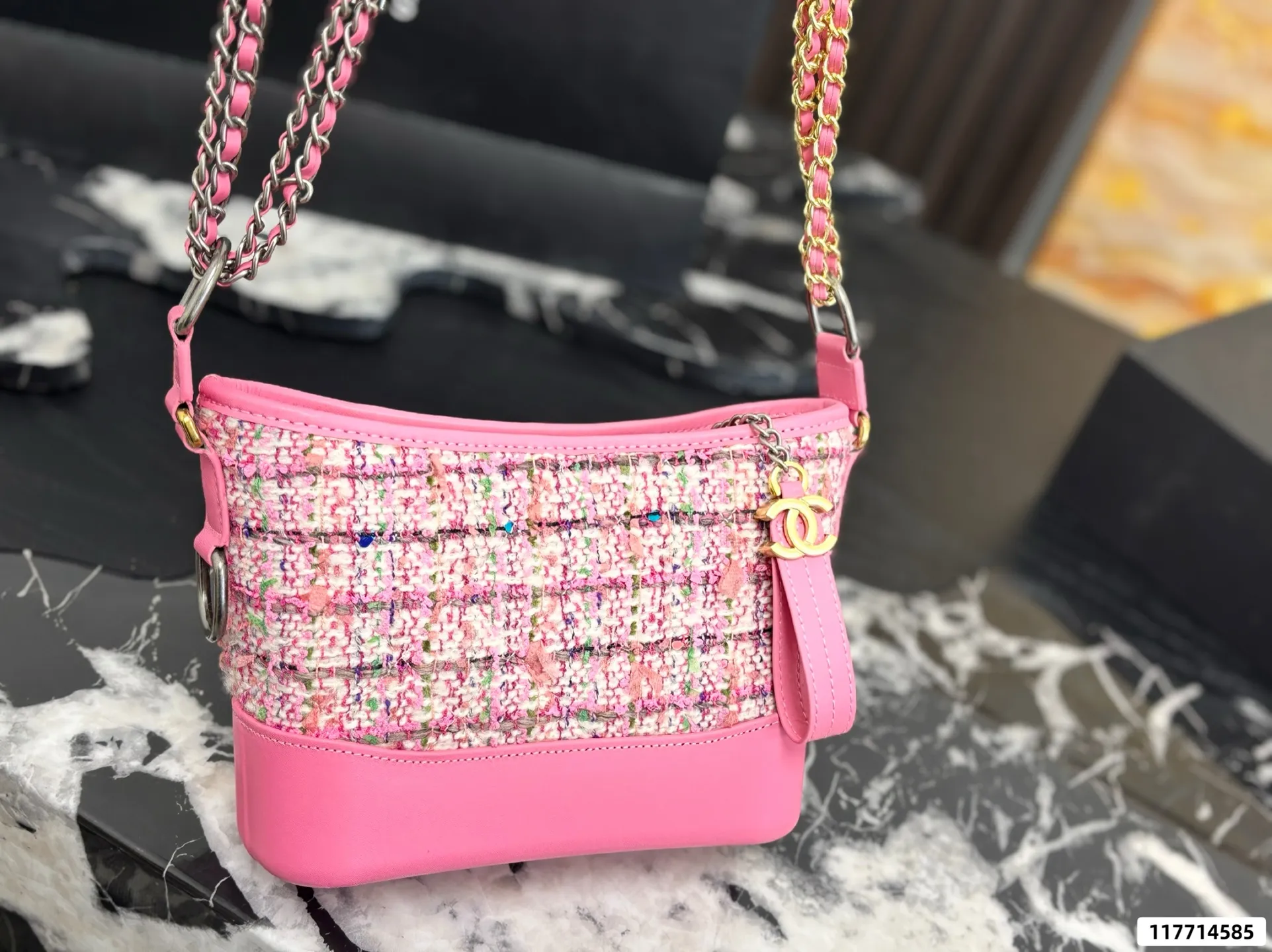 Collection of Chanel Gabrielle hobo bags in various materials including tweed and sequins with luxury packaging - xiashuluxe