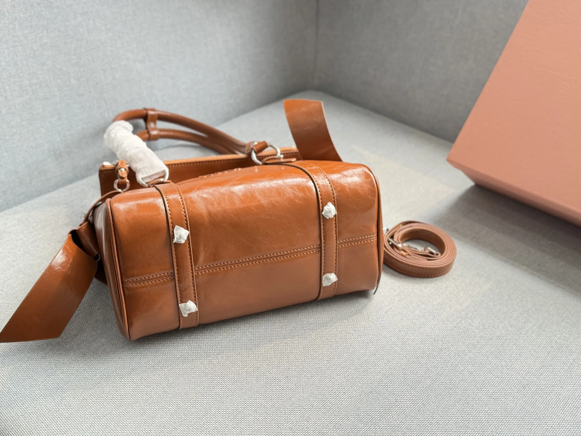 Collection of Miu Miu waxed leather shoulder bags with bow decorations in multiple colors (Black, Brown, Grey, Beige) - Size 26 - xiashuluxe