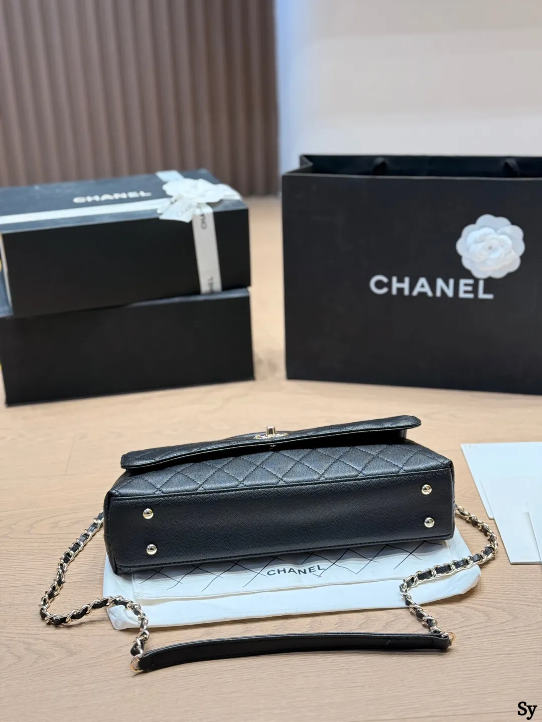 Chanel black caviar leather mini Kelly bag with top handle and gold hardware - xiashuluxe