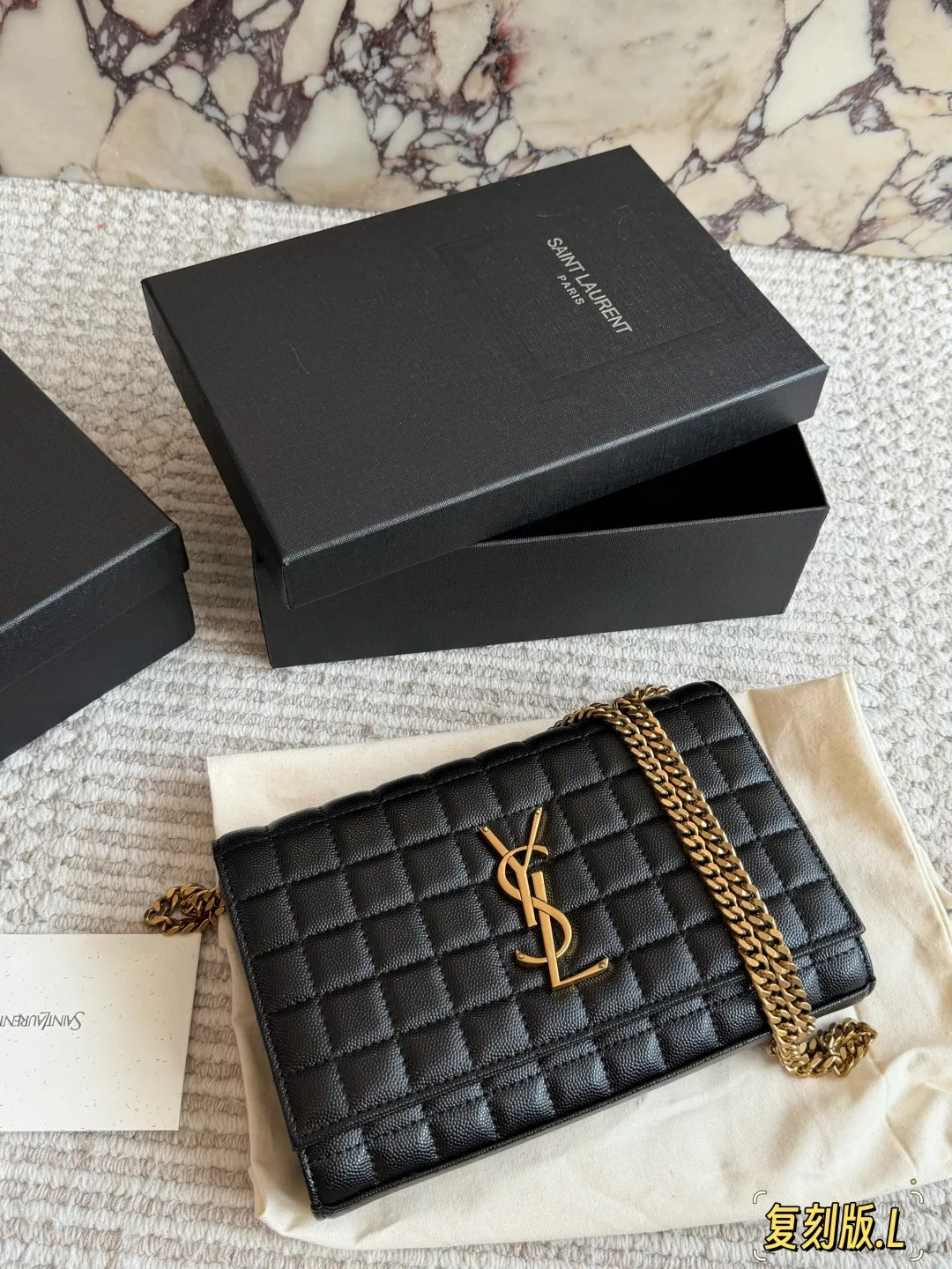 YSL Gaby white quilted leather envelope bag with original brand packaging - xiashuluxe