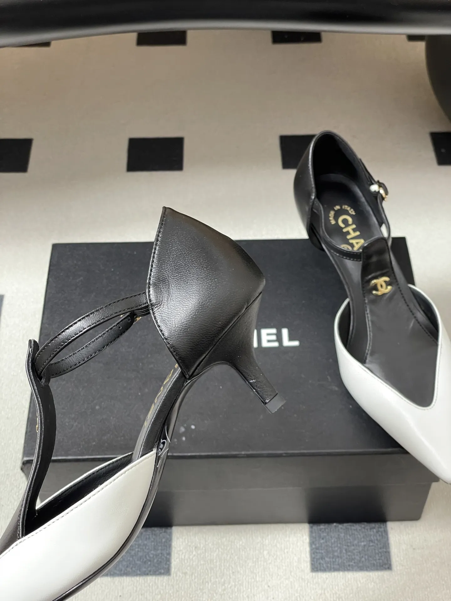 Chanel 1:1 premium apricot and black cap-toe T-strap kitten heels on luxury shoe box - xiashu