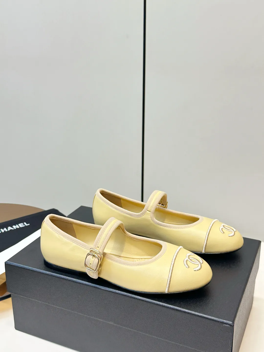 Chanel 1:1 premium Mary Jane flats in multiple colors (Black, White, Pink, Gold) with luxury packaging - xiashuluxe