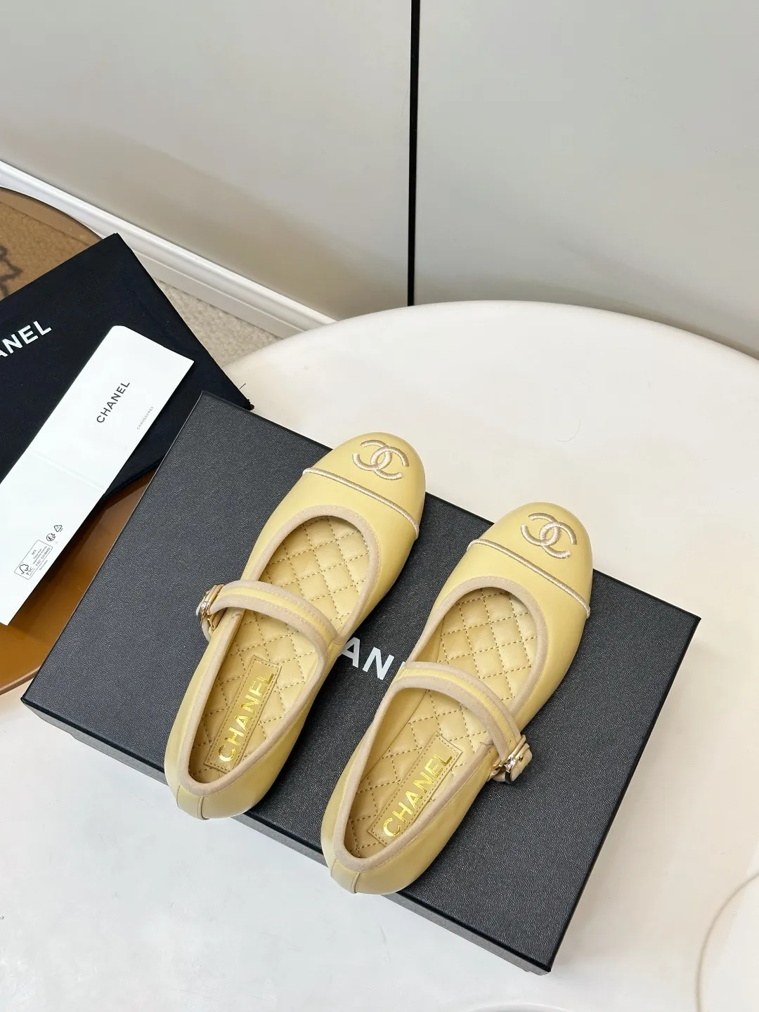 Chanel 1:1 premium Mary Jane flats in multiple colors (Black, White, Pink, Gold) with luxury packaging - xiashuluxe