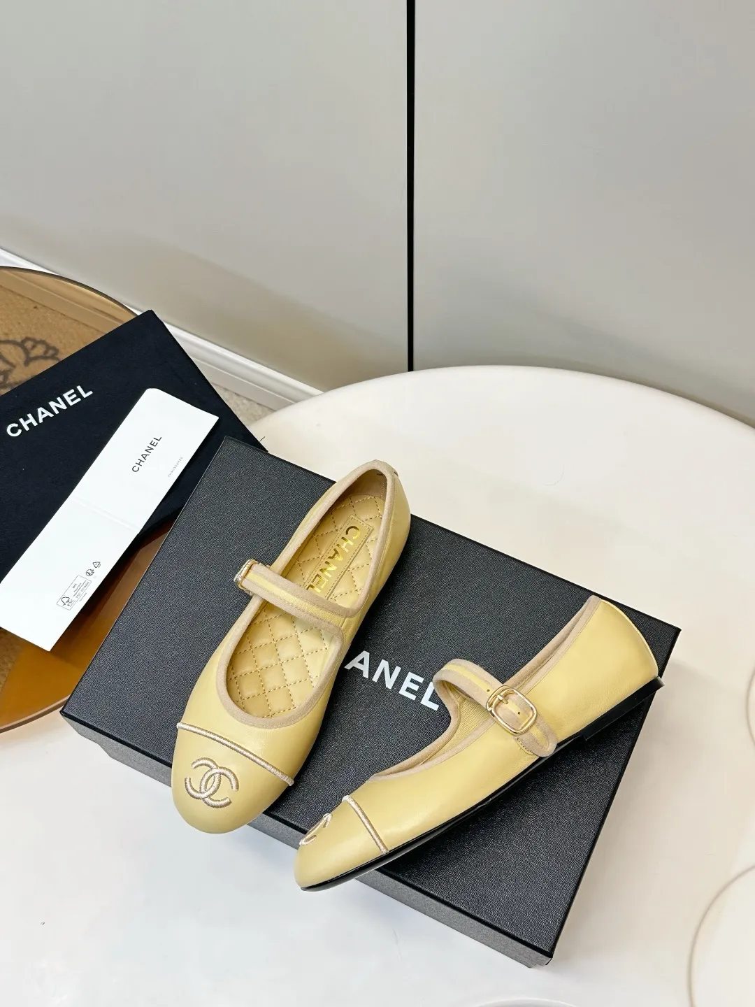Chanel 1:1 premium Mary Jane flats in multiple colors (Black, White, Pink, Gold) with luxury packaging - xiashuluxe