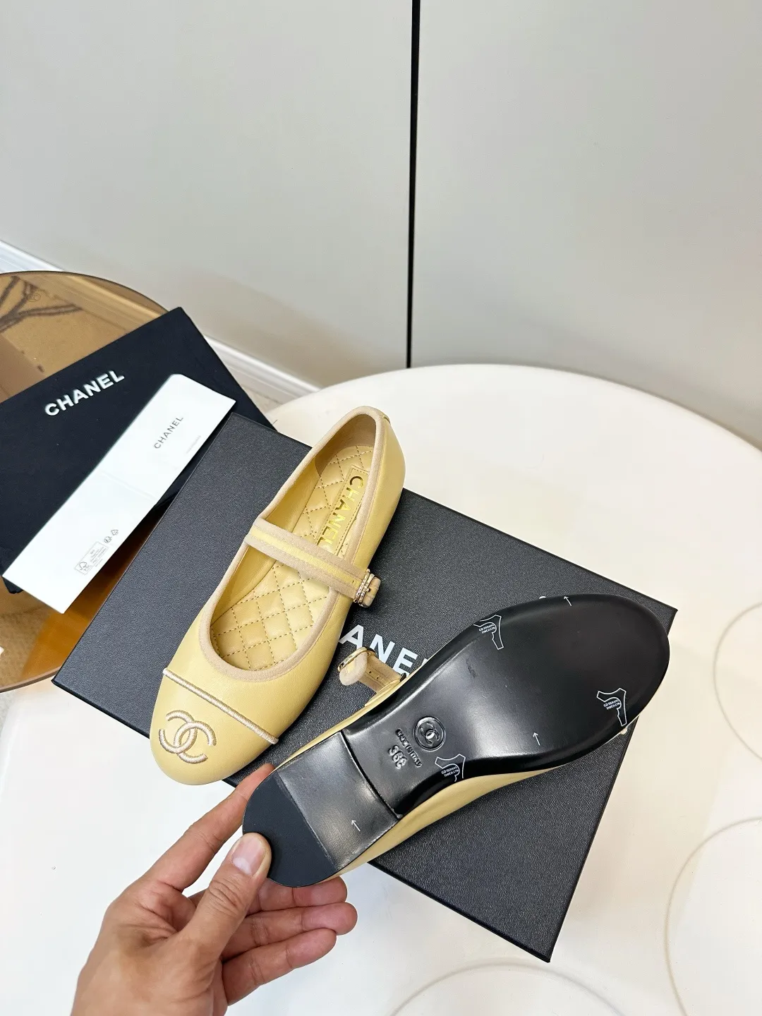Chanel 1:1 premium Mary Jane flats in multiple colors (Black, White, Pink, Gold) with luxury packaging - xiashuluxe