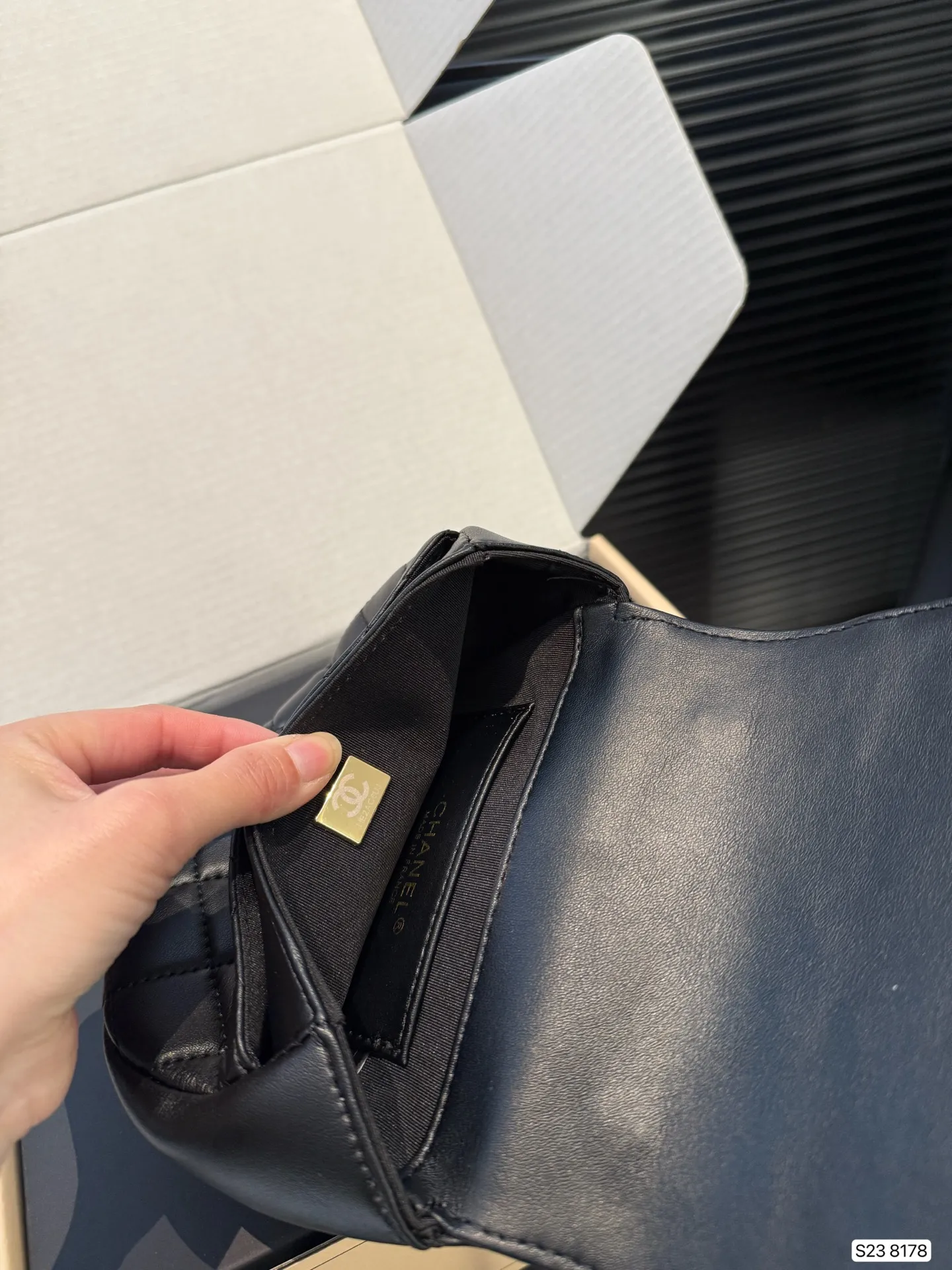 Chanel 1:1 premium 22 mini handbag in shiny black calfskin with gold hardware and CC medallion on luxury boutique box - xiashuluxe