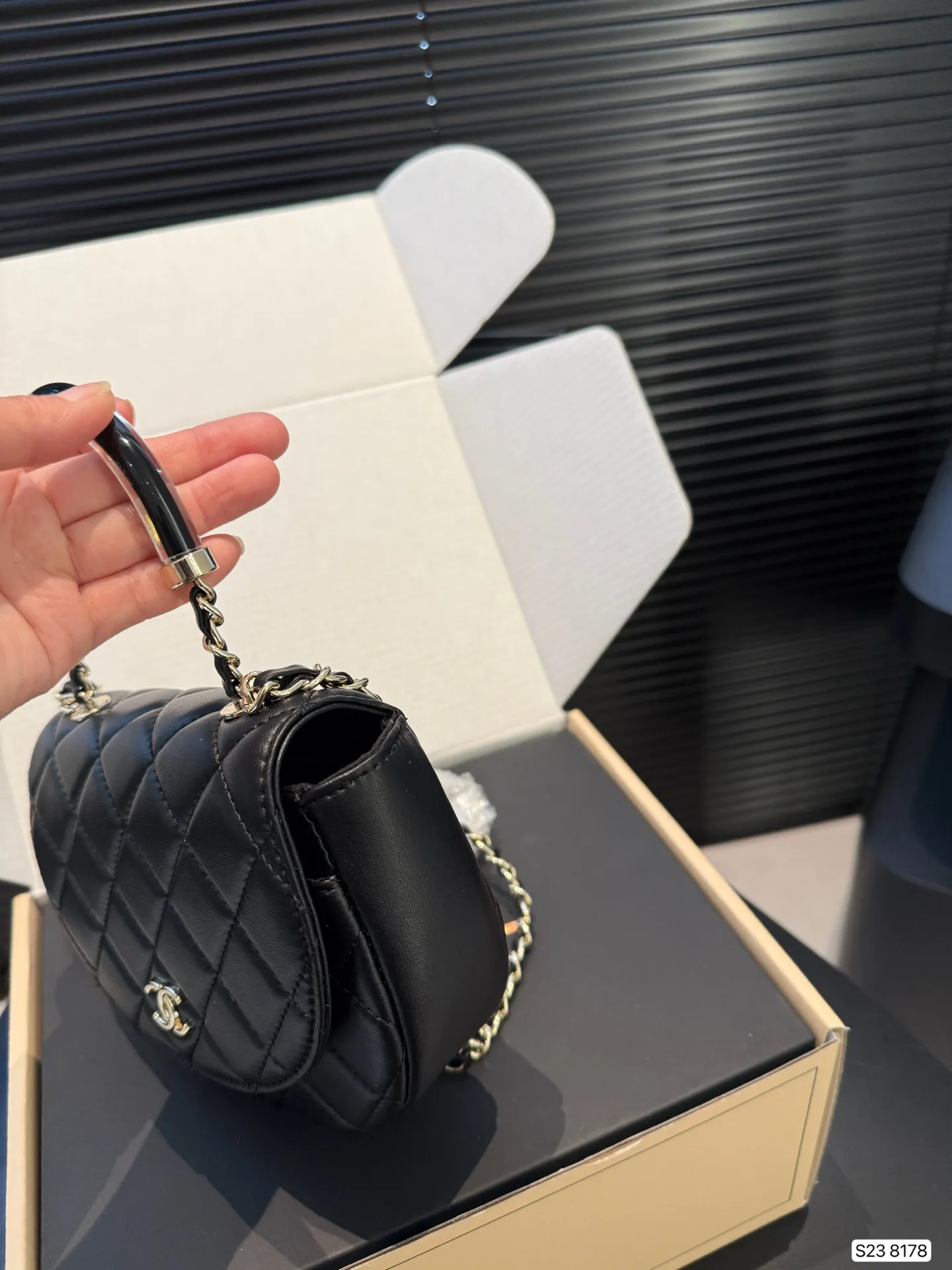 Chanel 1:1 premium 22 mini handbag in shiny black calfskin with gold hardware and CC medallion on luxury boutique box - xiashuluxe