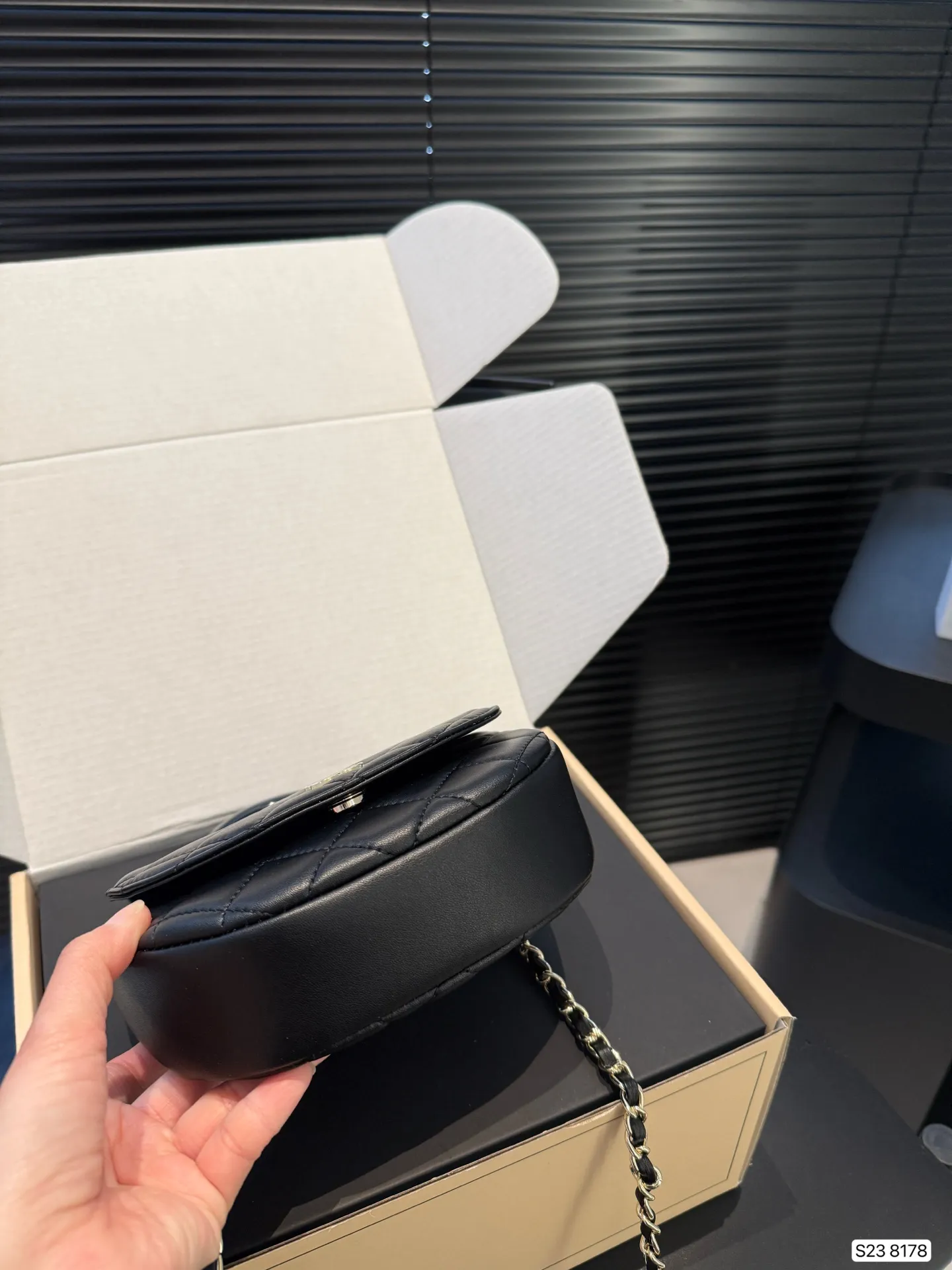 Chanel 1:1 premium 22 mini handbag in shiny black calfskin with gold hardware and CC medallion on luxury boutique box - xiashuluxe