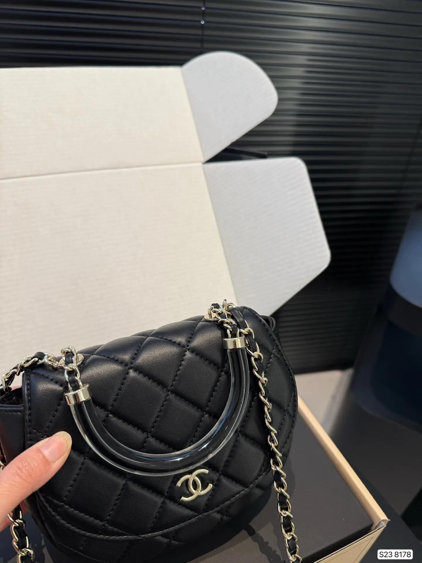 Chanel 1:1 premium 22 mini handbag in shiny black calfskin with gold hardware and CC medallion on luxury boutique box - xiashuluxe