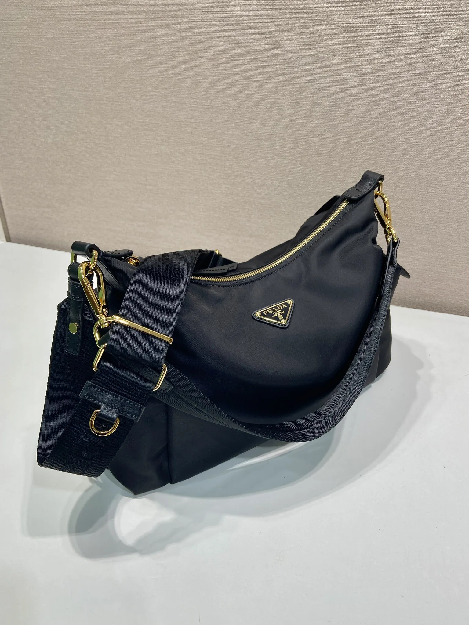 Prada 1:1 premium nylon hobo bag in black with triangle logo and detachable multi-way straps - xiashuluxe