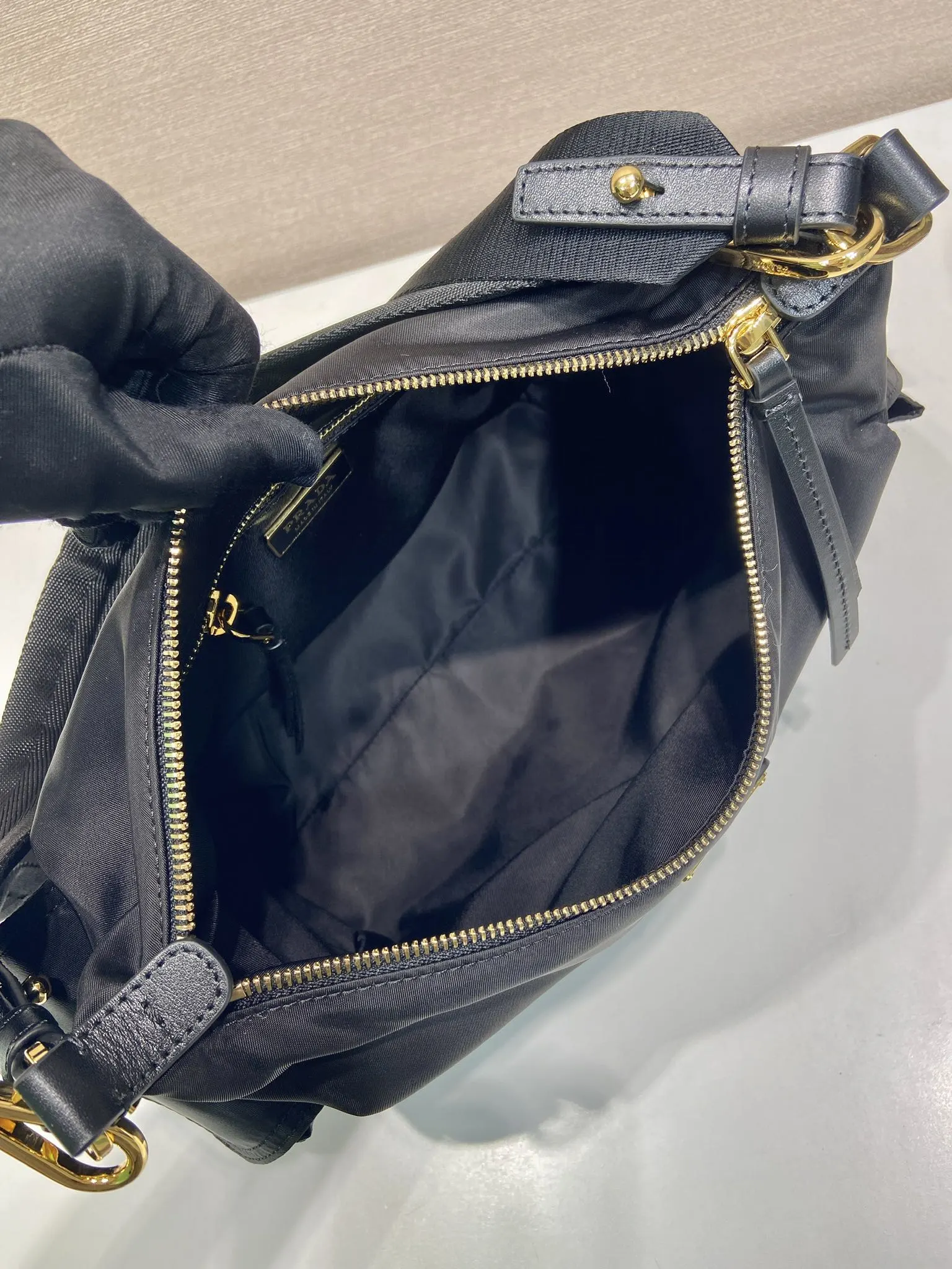 Prada 1:1 premium nylon hobo bag in black with triangle logo and detachable multi-way straps - xiashuluxe