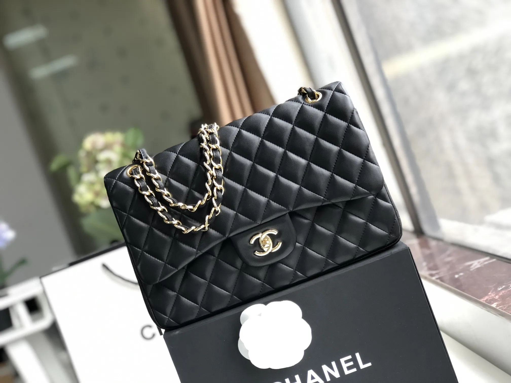 Chanel 1:1 premium Classic Flap bag in black lambskin with gold-tone hardware and signature diamond quilting on Chanel box - xiashuluxe