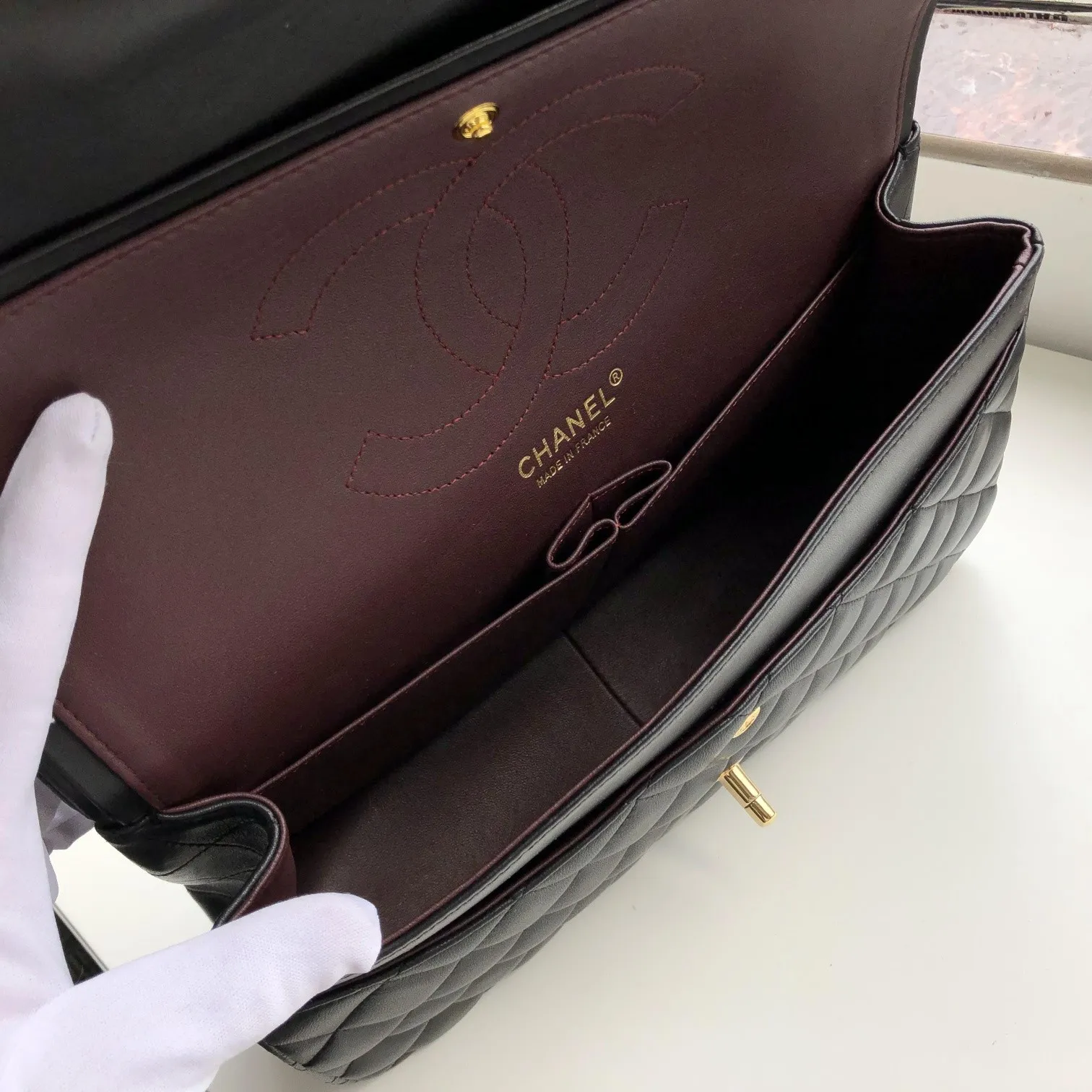 Chanel 1:1 premium Classic Flap bag in black lambskin with gold-tone hardware and signature diamond quilting on Chanel box - xiashuluxe