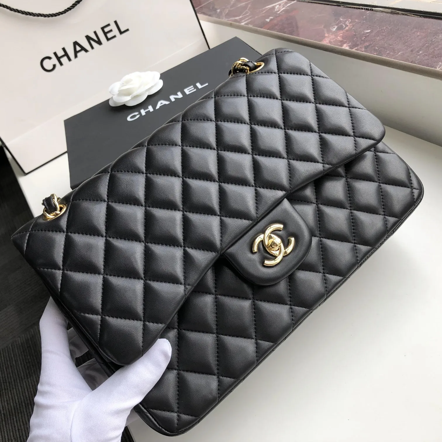 Chanel 1:1 premium Classic Flap bag in black lambskin with gold-tone hardware and signature diamond quilting on Chanel box - xiashuluxe