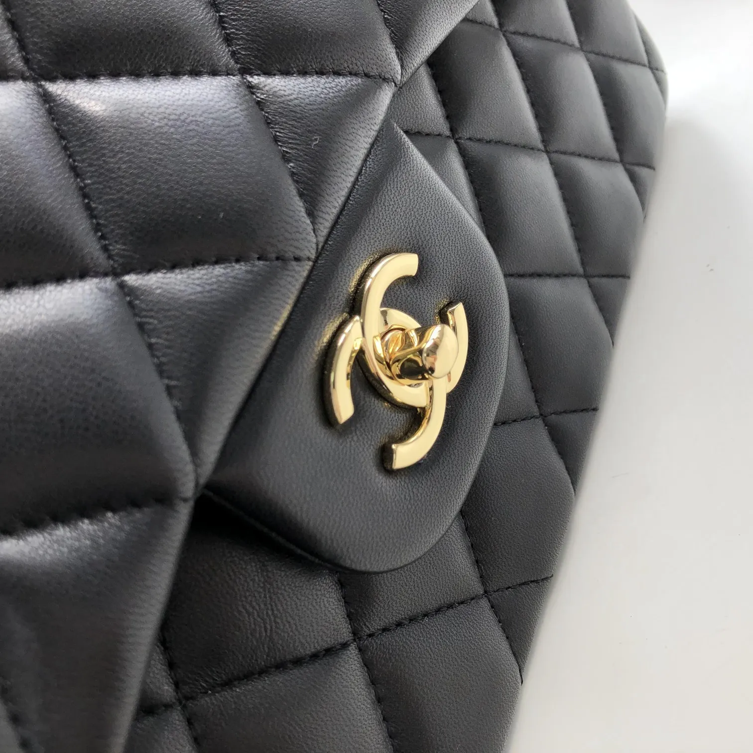 Chanel 1:1 premium Classic Flap bag in black lambskin with gold-tone hardware and signature diamond quilting on Chanel box - xiashuluxe
