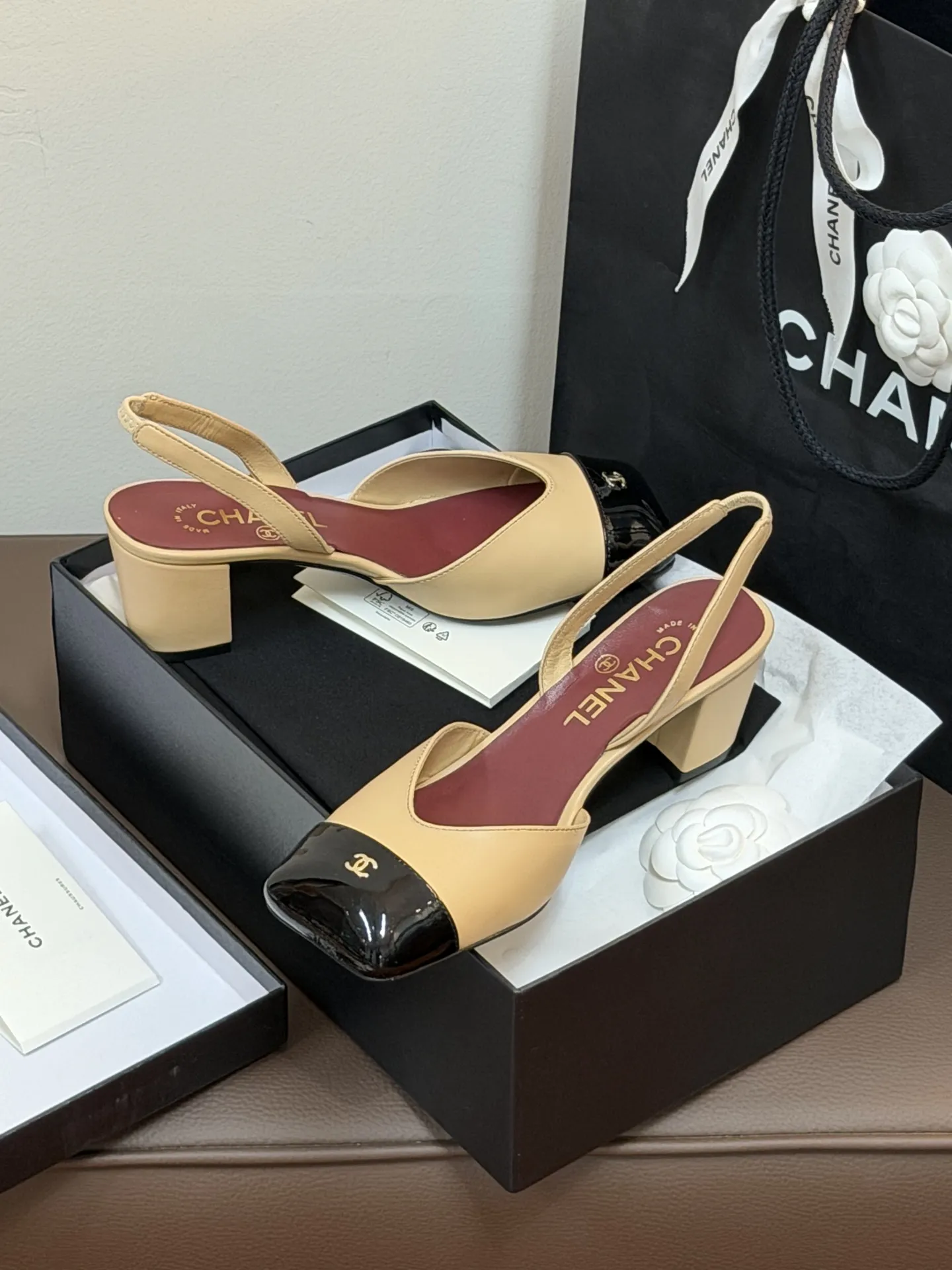 Chanel 1:1 premium Slingback pumps in beige-black, all-black, and white-gold two-tone lambskin with boutique packaging - xiashuluxe
