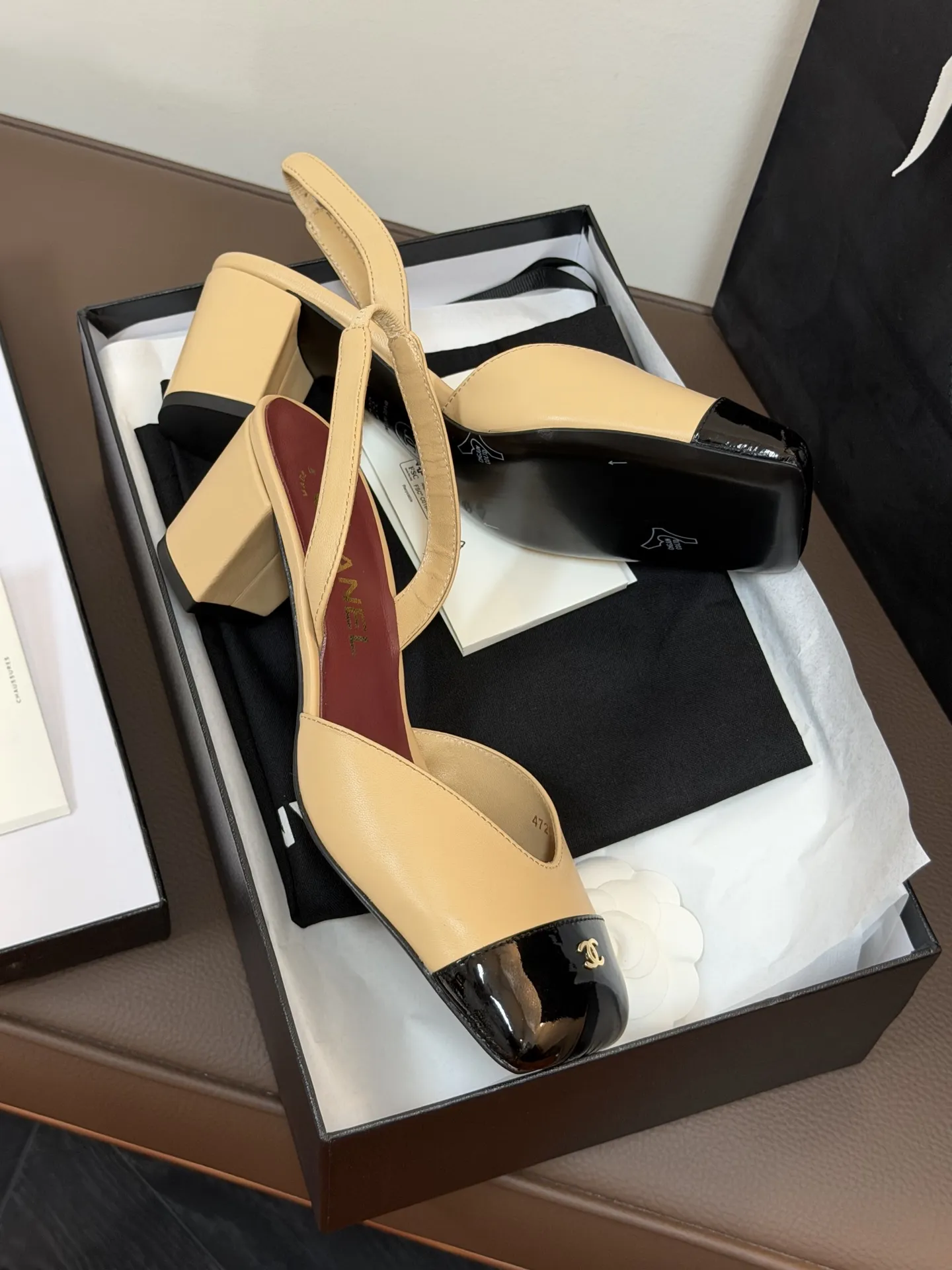 Chanel 1:1 premium Slingback pumps in beige-black, all-black, and white-gold two-tone lambskin with boutique packaging - xiashuluxe