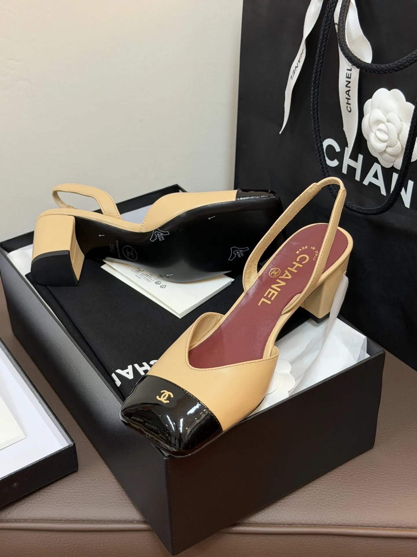 Chanel 1:1 premium Slingback pumps in beige-black, all-black, and white-gold two-tone lambskin with boutique packaging - xiashuluxe
