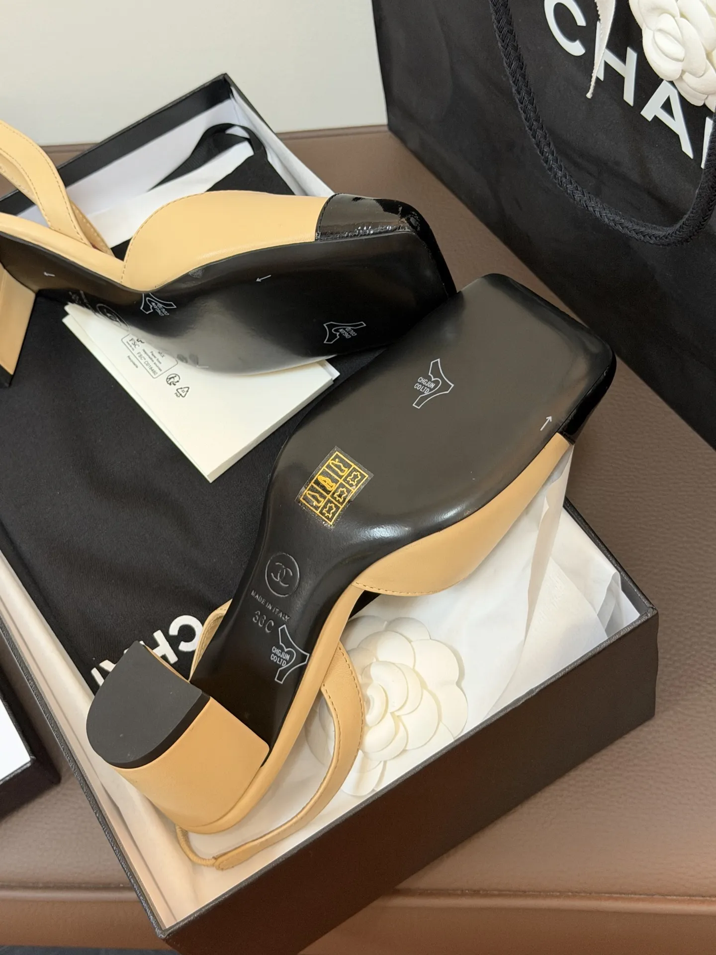Chanel 1:1 premium Slingback pumps in beige-black, all-black, and white-gold two-tone lambskin with boutique packaging - xiashuluxe