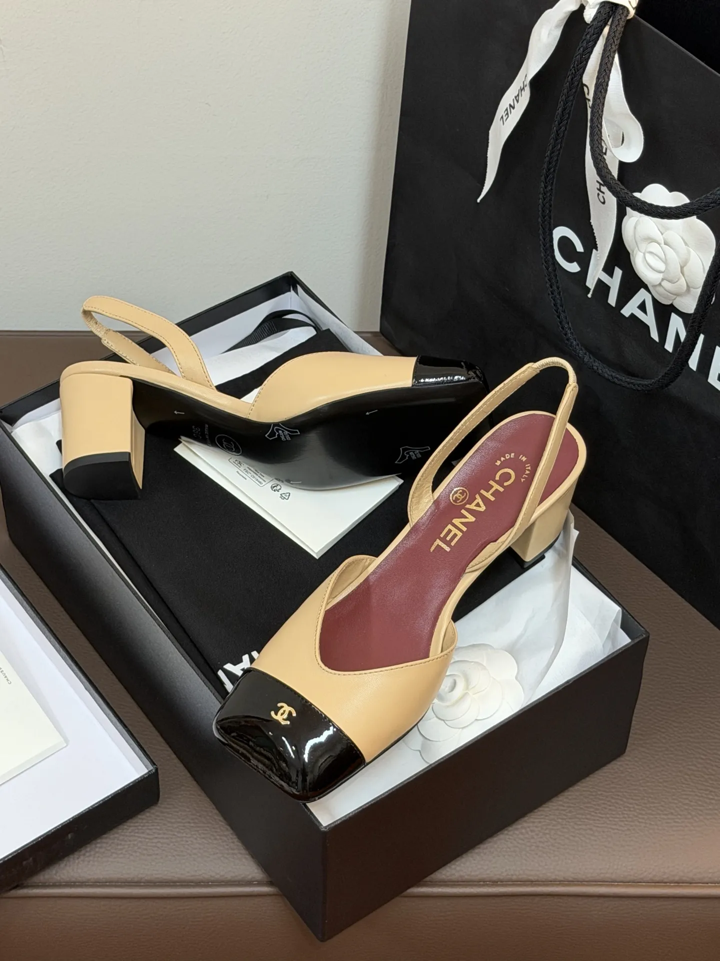 Chanel 1:1 premium Slingback pumps in beige-black, all-black, and white-gold two-tone lambskin with boutique packaging - xiashuluxe