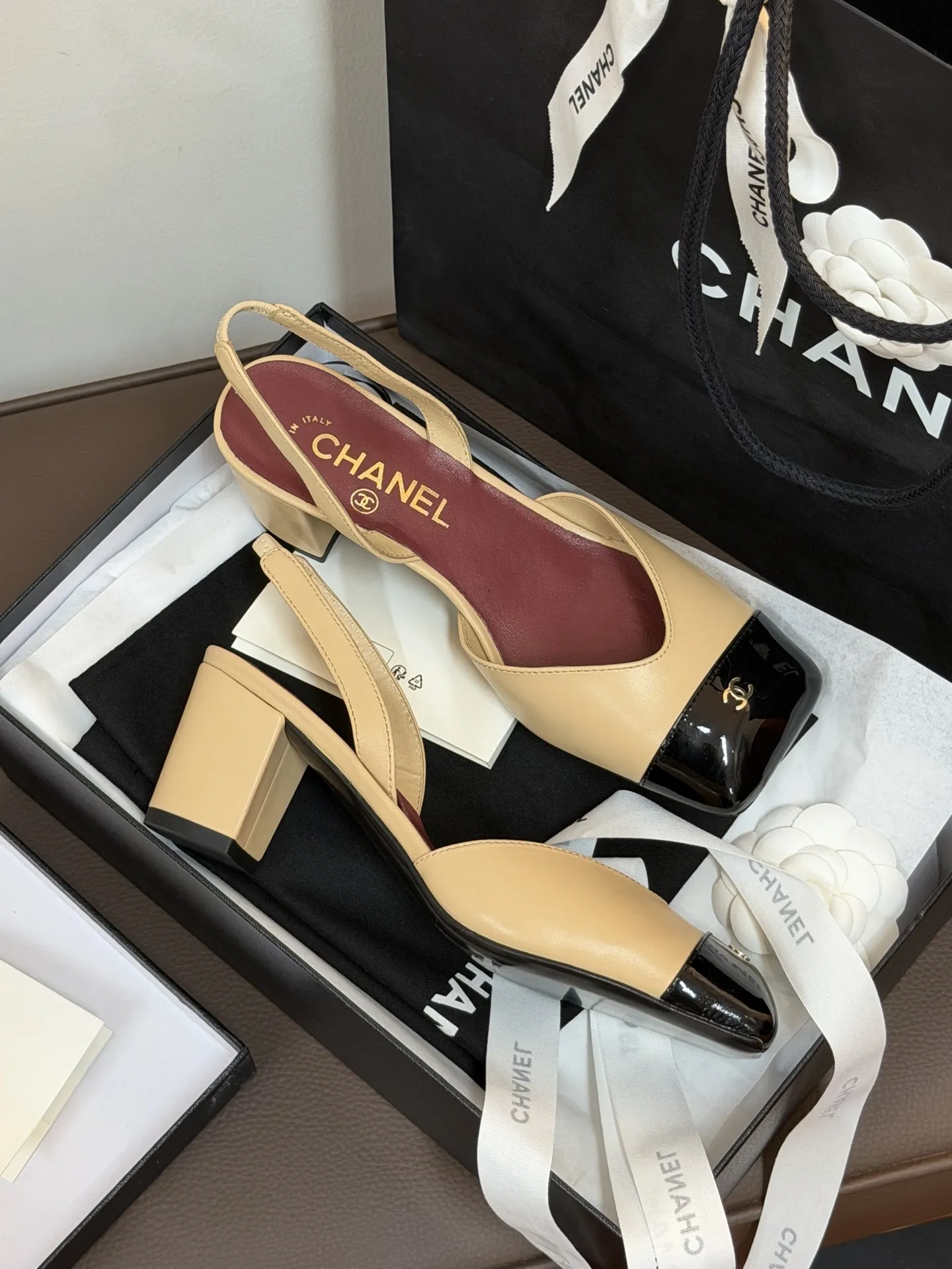 Chanel 1:1 premium Slingback pumps in beige-black, all-black, and white-gold two-tone lambskin with boutique packaging - xiashuluxe