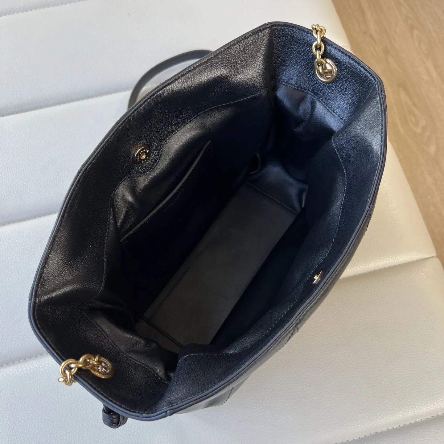 YSL 1:1 premium June Hobo bag in black quilted lambskin featuring gold-tone pivoting monogram closure and chain shoulder strap - xiashuluxe