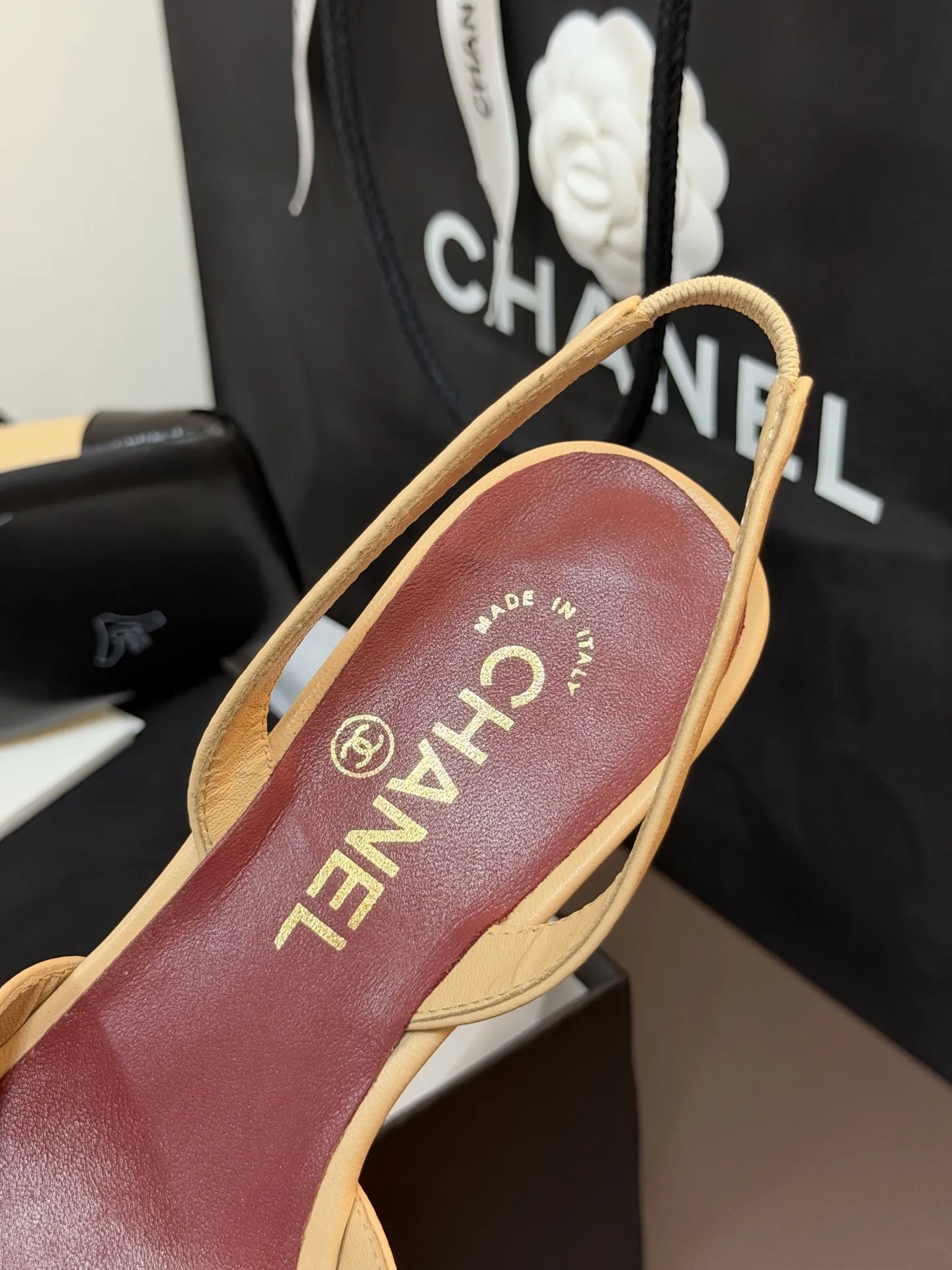 Chanel 1:1 premium Slingback pumps in beige-black, all-black, and white-gold two-tone lambskin with boutique packaging - xiashuluxe